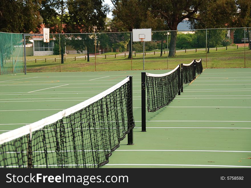 Black tennis nets found in a public tennis court in australia. Black tennis nets found in a public tennis court in australia