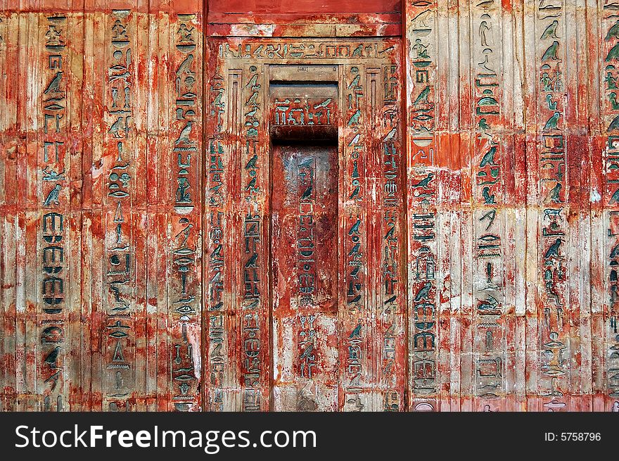 Ancient egyptian hieroglyphs engraved in a door