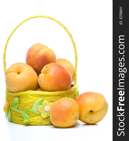 Fresh appetizing apricots on a white background. Fresh appetizing apricots on a white background