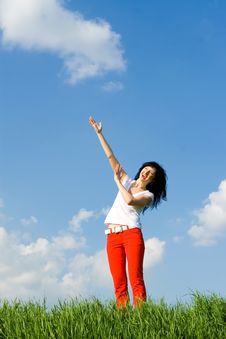 Woman On A Green Meadow And Show Something Stock Images Woman On A Green Meadow And Show Something Stock Images
