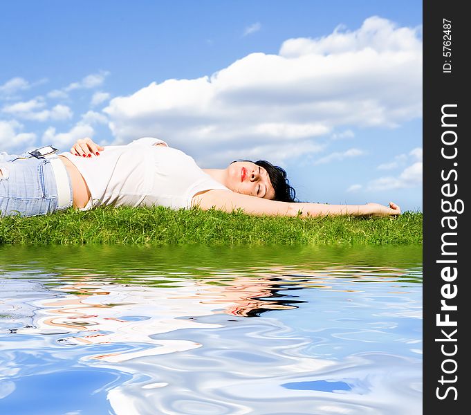 Woman Rest On The Green Grass