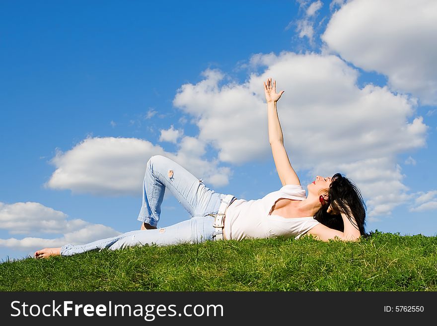 Woman Rest On The Green Grass