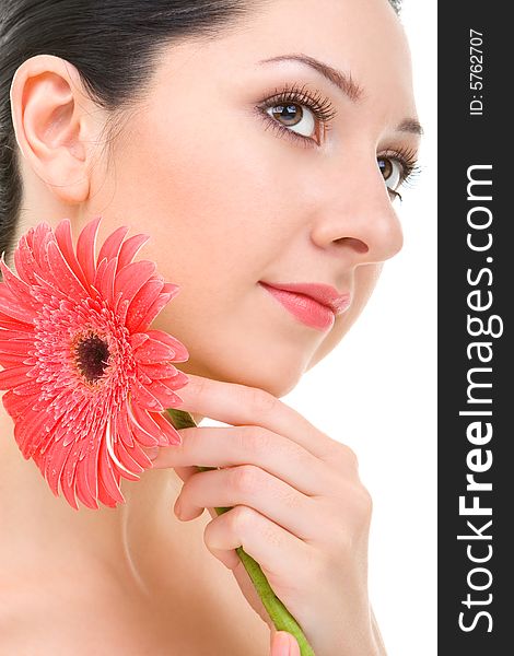 Young woman with gerber flower