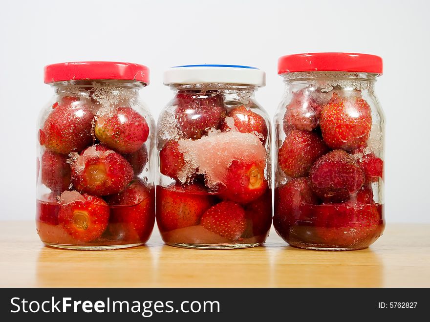 Strawberrys in jars before to boil. Home maded preserves.