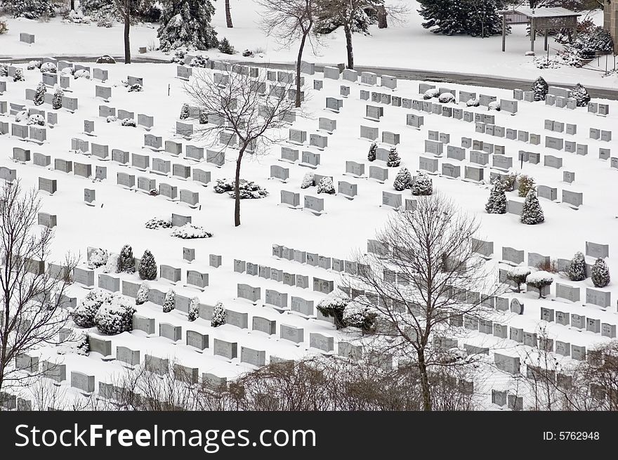 Cemetery in winter time in snow