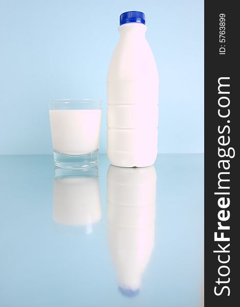 Full cream milk isolated against a blue background