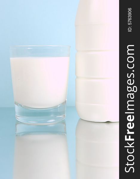 Full cream milk isolated against a blue background