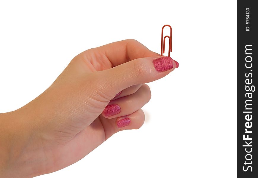 Paper clip in hand isolated on white background