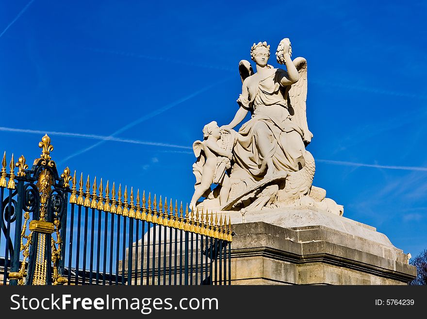 The picture is made in gate to Versailles. The picture is made in gate to Versailles