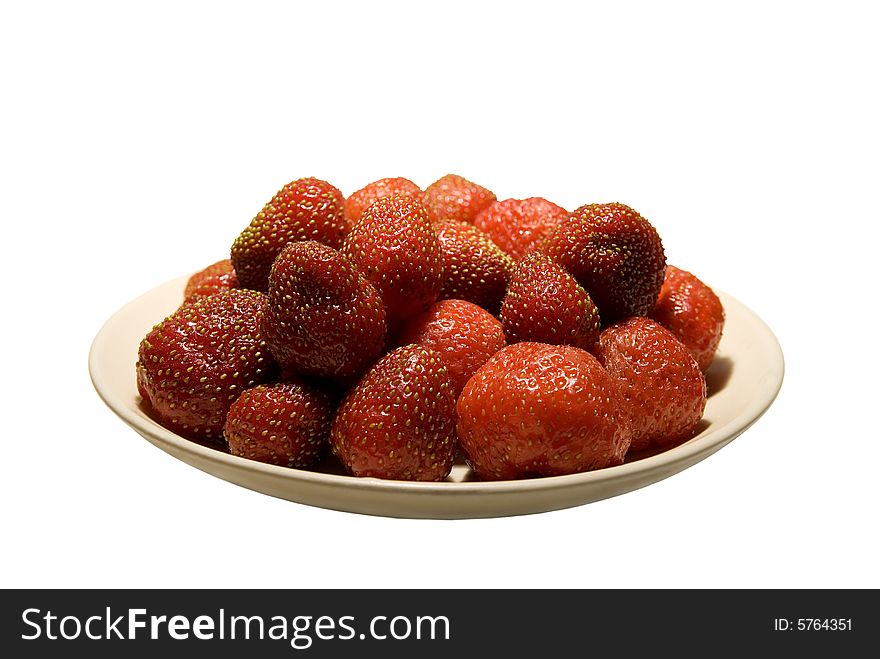 Strawberries to plate on white background
