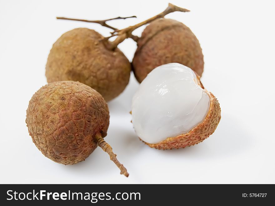 Four pieces of lychees on white background