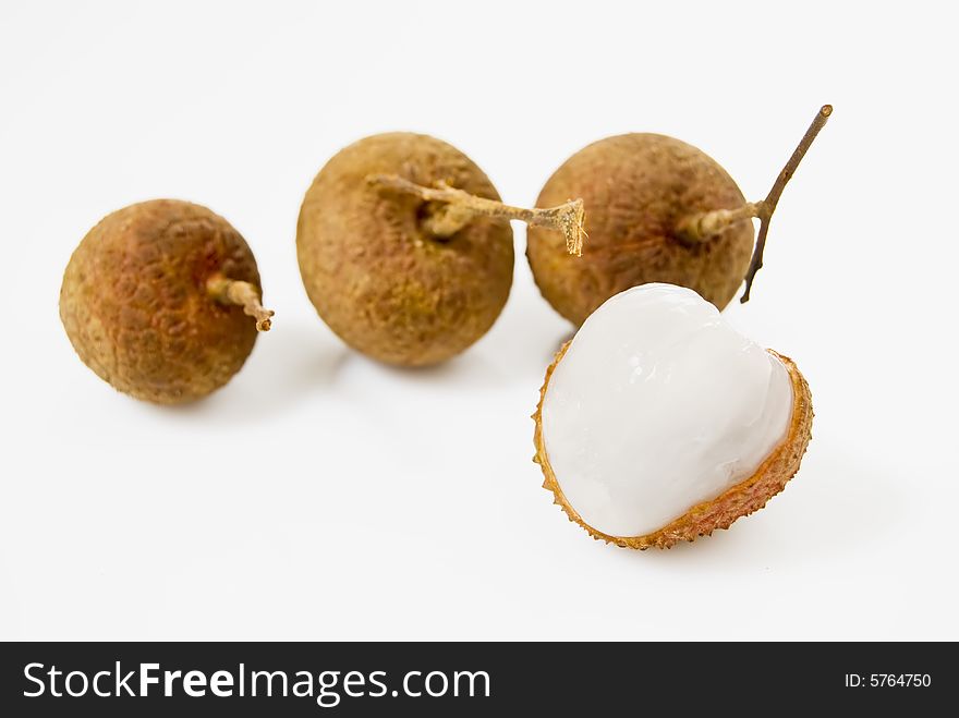 Four pieces of Lychees on white background