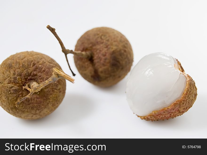 Three pieces of Lychees on white background