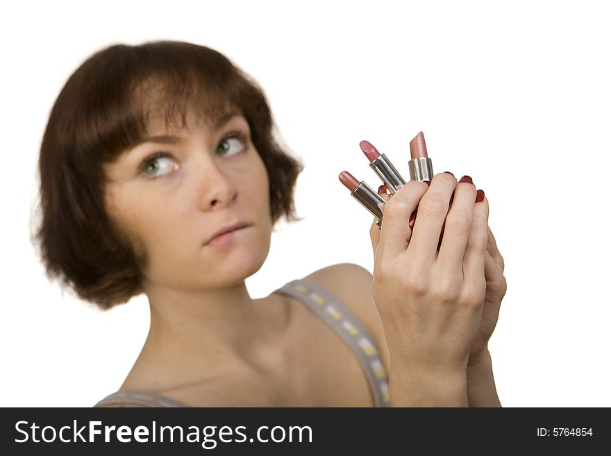 Woman choosing a lipstick