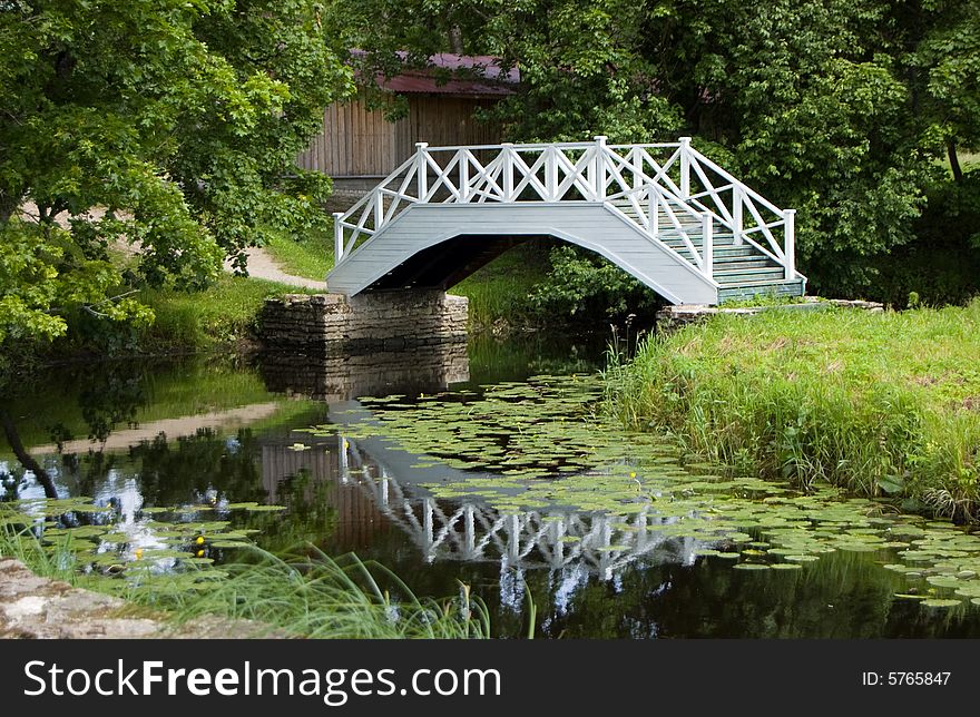 Little white bridge and river. Little white bridge and river