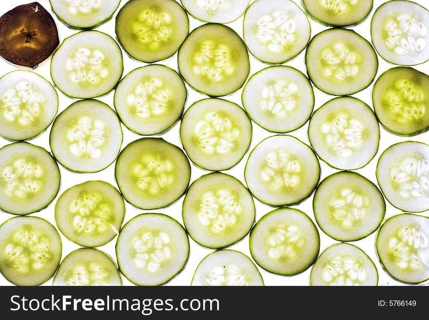 Sliced cucumber isolated on white background.