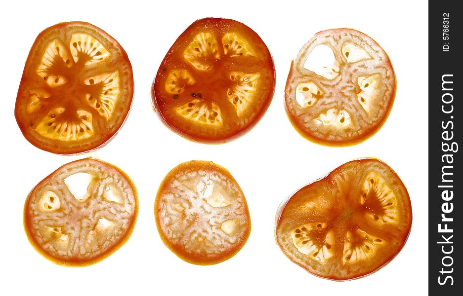 Sliced tomato isolated on white background. Sliced tomato isolated on white background.
