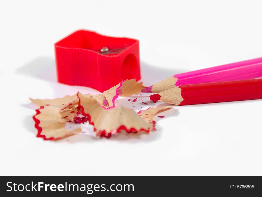 Pencil and sharpener on a white background