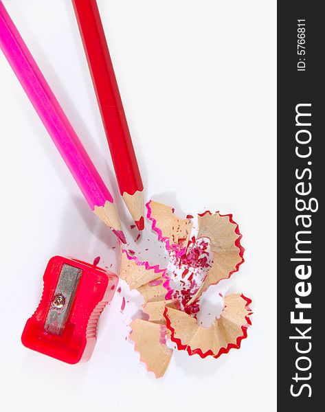 Pencils and sharpener on a white background