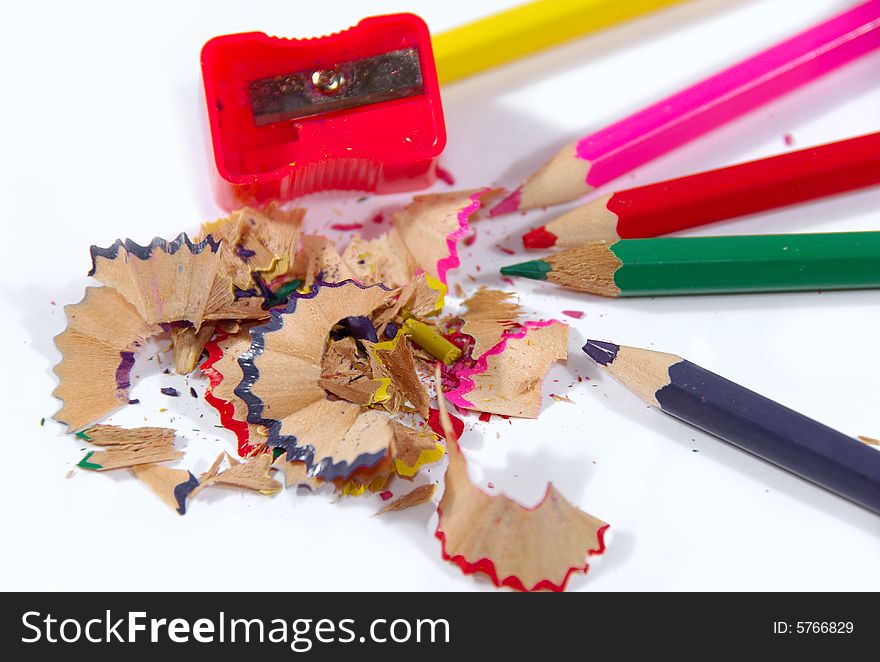 Pencils and sharpener on a white background