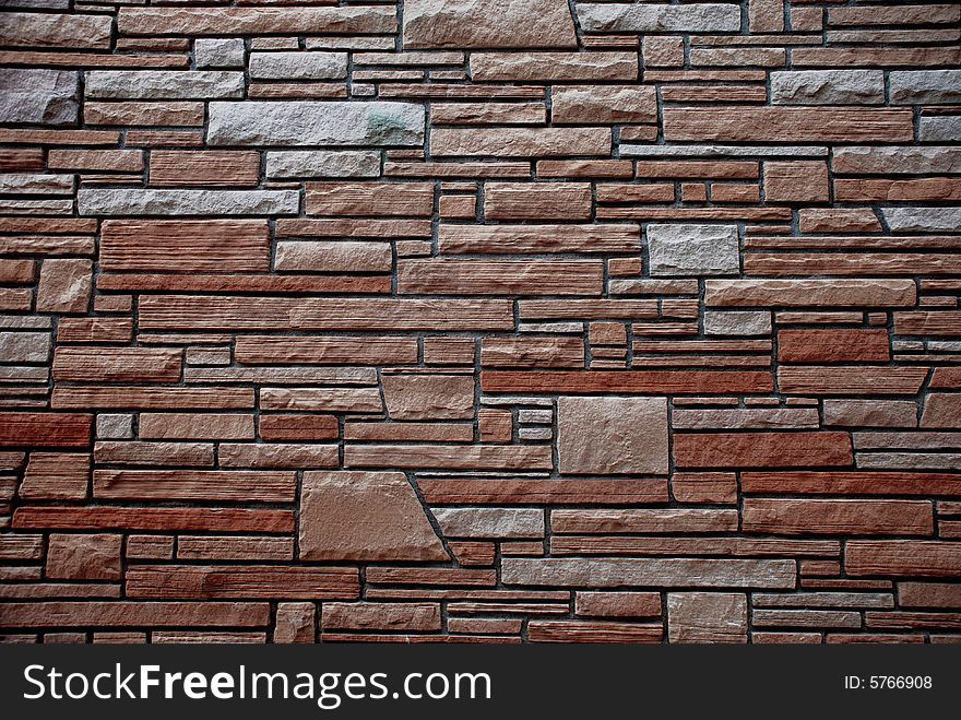 A classic 1970's style stone wall pattern using sandstone blocks. A classic 1970's style stone wall pattern using sandstone blocks