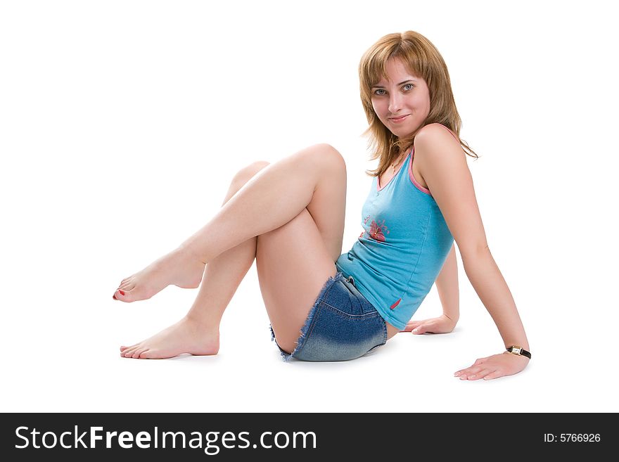 Nice girl carries out sports exercises isolated on a white background. Nice girl carries out sports exercises isolated on a white background