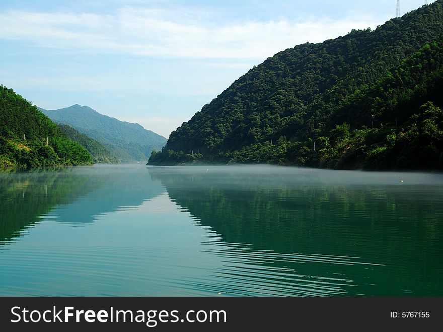 Fog on the river in summer. The water was very cold, the fog formed in the morning and evening