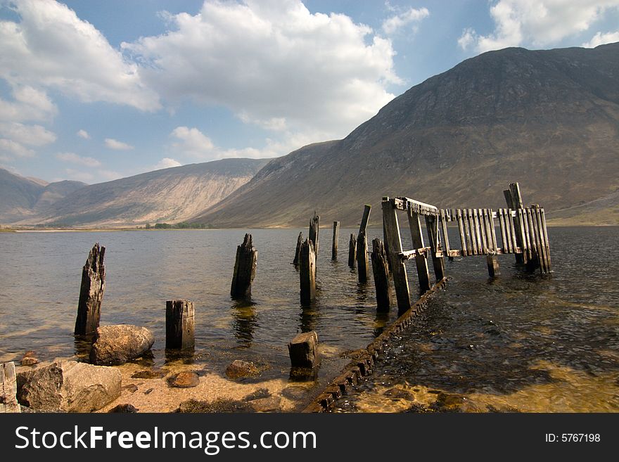 Glen Coe, lake and ruins of pier