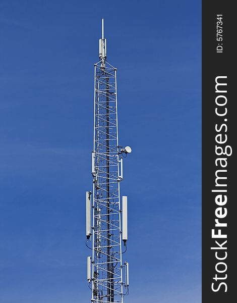 Telecommunication tower on a blue sky. Telecommunication tower on a blue sky.