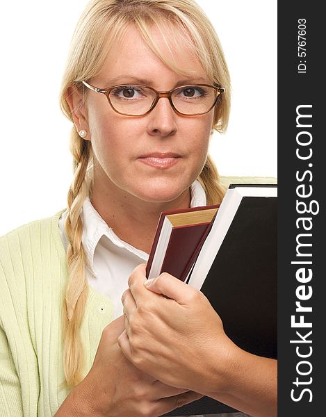 Attractive Woman with a Stack of Books Isolated on a White Background. Attractive Woman with a Stack of Books Isolated on a White Background.