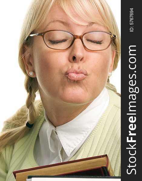 Beautiful Woman Puckers & Carries Stack of Books