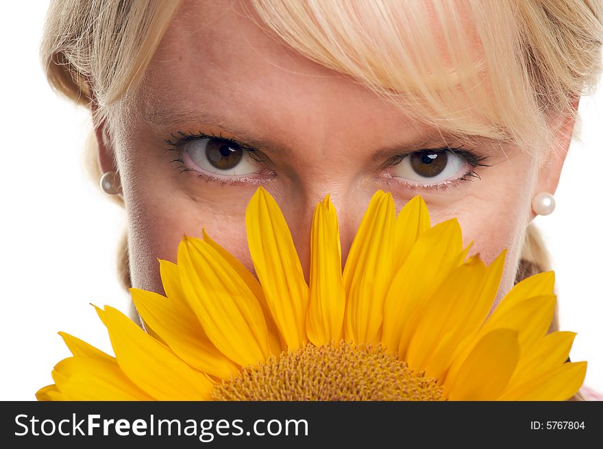 Attractive Blond with Sunflower Isolated on a White Background.