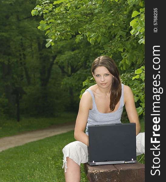 Young Business Woman Relaxing, Working On Laptop