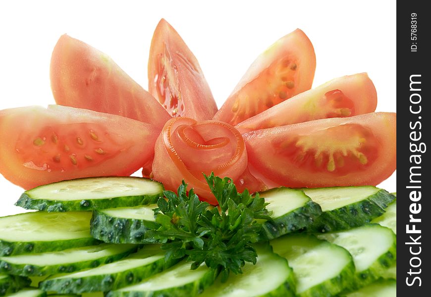 Sliced fresh cucumber and tomato. Sliced fresh cucumber and tomato
