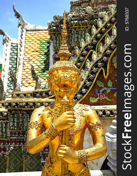 Thailand Bangkok; the wat Phra Kaew shelter the most sacred image of Thailand the Emerald Buddha. The temple is situated in the northeast corner of the Grand Palace. View of a giant or yakshas. Thailand Bangkok; the wat Phra Kaew shelter the most sacred image of Thailand the Emerald Buddha. The temple is situated in the northeast corner of the Grand Palace. View of a giant or yakshas