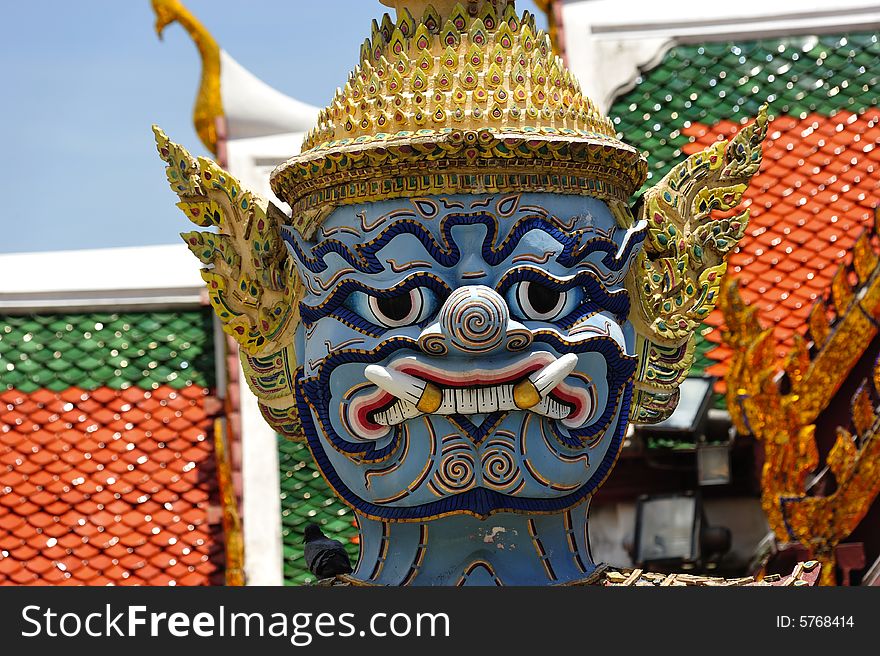 Thailand Bangkok; the wat Phra Kaew shelter the most sacred image of Thailand the Emerald Buddha. The temple is situated in the northeast corner of the Grand Palace. View of a giant or yakshas. Thailand Bangkok; the wat Phra Kaew shelter the most sacred image of Thailand the Emerald Buddha. The temple is situated in the northeast corner of the Grand Palace. View of a giant or yakshas