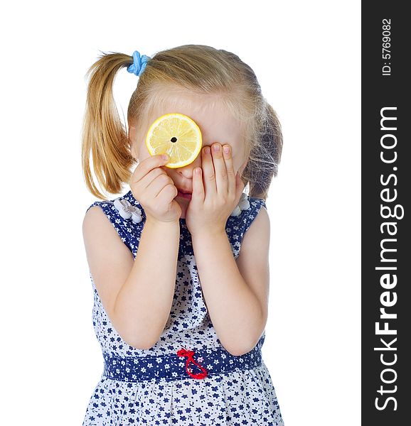 little cute girl holding fresh lemon, isolated on white background