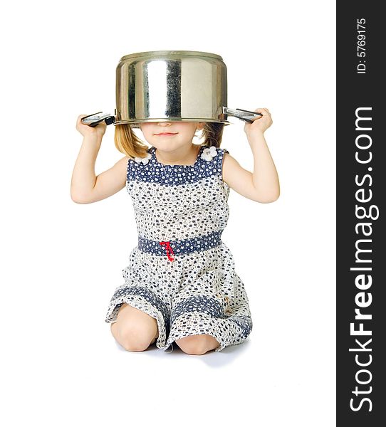 Little cute girl holding saucepan over her head, isolated