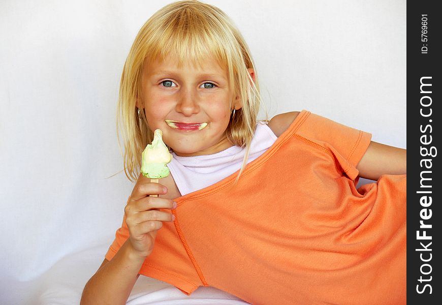 Adorable girl eating an ice cream. Adorable girl eating an ice cream