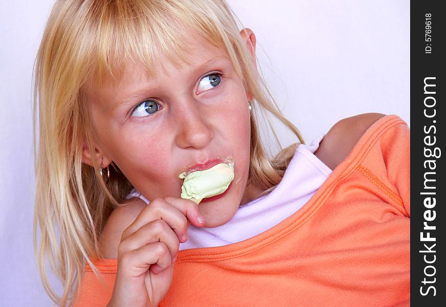 Adorable girl eating an ice cream. Adorable girl eating an ice cream