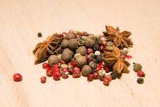 A Mixture Of Grains Of Pepper And Star Anise On A Wooden Surface Stock Image A Mixture Of Grains Of Pepper And Star Anise On A Wooden Surface Stock Image