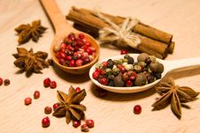 Spoons With A Mixture Of Grains Of Pepper, Cinnamon And Star Ani Stock Images Spoons With A Mixture Of Grains Of Pepper, Cinnamon And Star Ani Stock Images