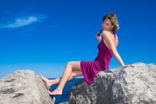 Lady On The Rocks Royalty Free Stock Photos