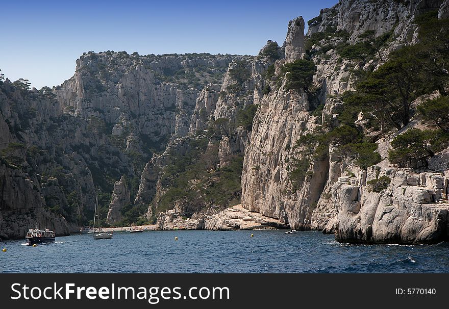 Calanques coastline near Marseille on French Riviera, france, with boat, en-vau. Calanques coastline near Marseille on French Riviera, france, with boat, en-vau