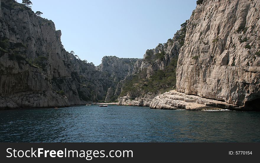 Calanques coastline near Marseille on French Riviera, france, with boat, en-vau. Calanques coastline near Marseille on French Riviera, france, with boat, en-vau