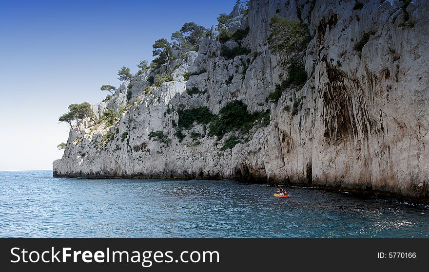 Calanques coastline near Marseille on French Riviera, france, with boat, en-vau. Calanques coastline near Marseille on French Riviera, france, with boat, en-vau