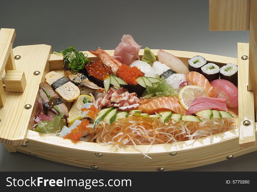 Sushi on wood plate like boat