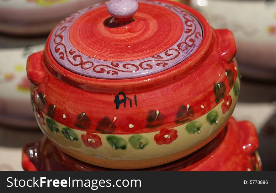 Colourful ceramics on the French Riviera, red pot flover pottery