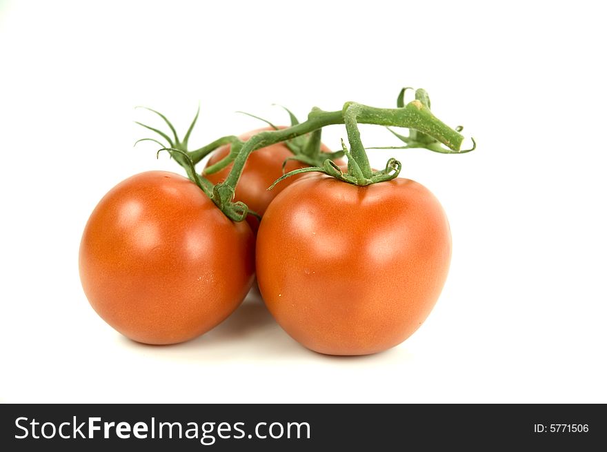 Ripe Orange Tomatoes with leaves
