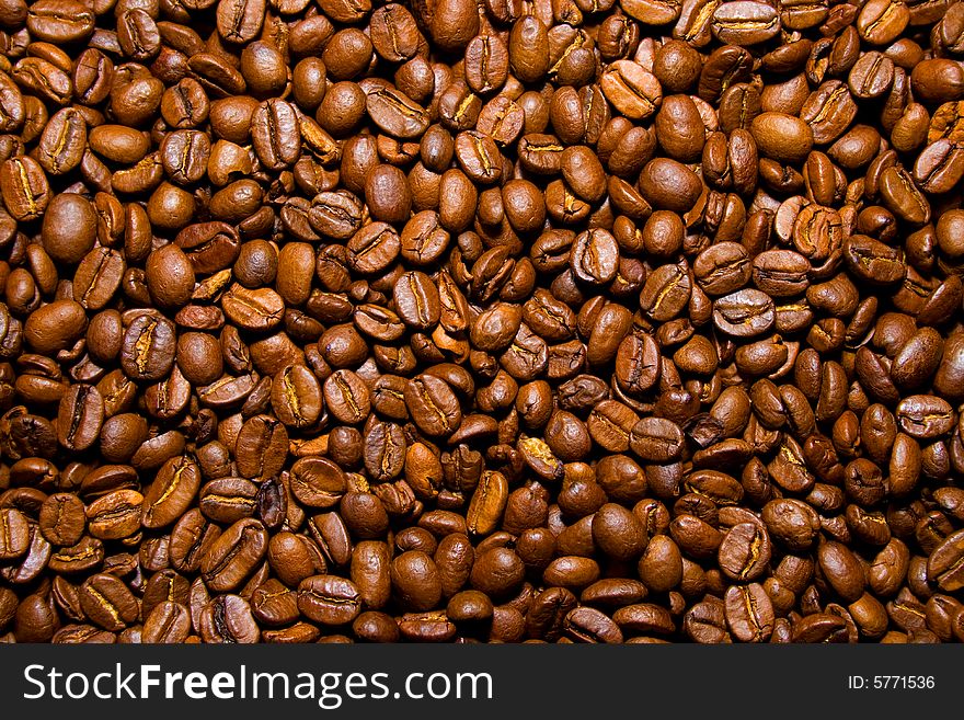Heap of brown coffee beans. Heap of brown coffee beans